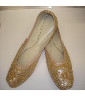 Gold sequined flat shoes